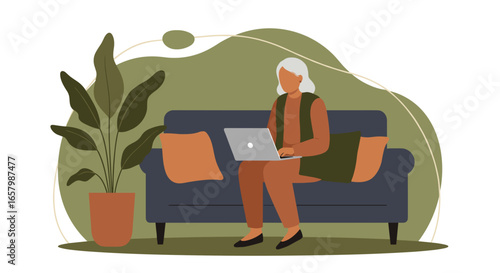 Mature woman working on laptop at home, sitting comfortably on sofa. Illustrates remote work, online learning, or digital lifestyle for seniors.