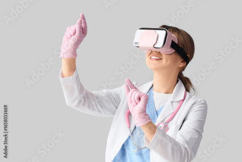 Female doctor in VR glasses...