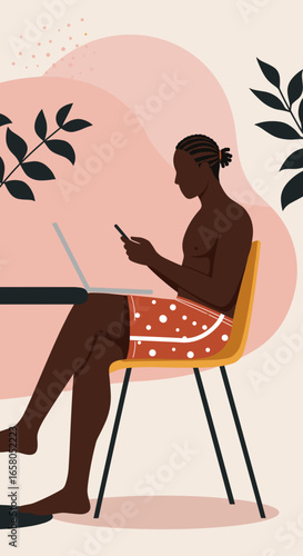 Young man in swim shorts uses laptop and smartphone in a relaxed setting, blending remote work with leisure and modern lifestyle.