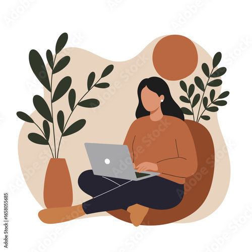 Woman comfortably working on laptop at home, embodying remote work, online education, or digital freelance lifestyle in a cozy, modern setting.