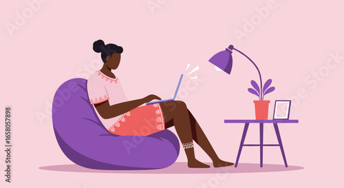 Woman comfortably working on laptop from a bean bag chair at home, symbolizing remote work, freelancing, and digital lifestyle.