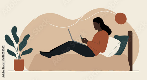 Person comfortably using a laptop and smartphone on a bed at home, illustrating remote work, online learning, or digital leisure in a cozy setting.