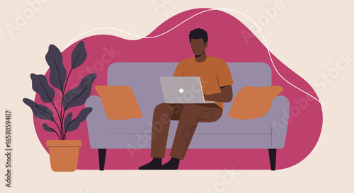 Man working from home on laptop, sitting comfortably on a couch. Represents remote work, online education, and modern digital lifestyle.