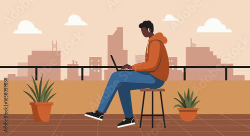 Young man works on laptop from a city rooftop, embodying modern remote work and flexible urban lifestyle.