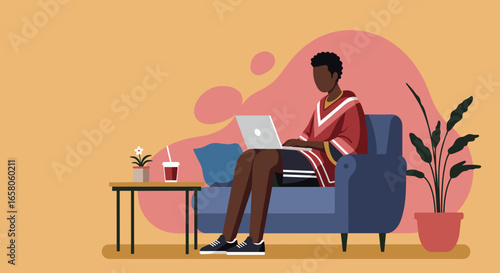 Young man working or studying comfortably on a laptop from his home couch, showcasing remote productivity, digital lifestyle, and online learning.