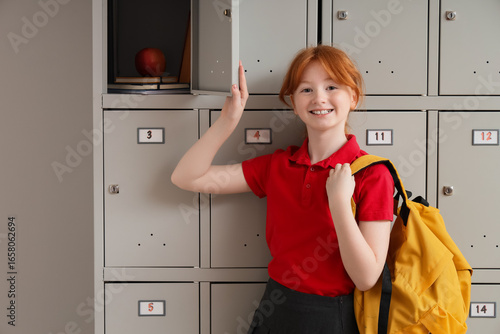 Teenage schoolgirl opening ...