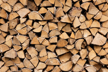 Fototapete Brennholz Textur A pile of wood logs with a lot of different sizes  © Pawel