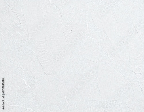 白い漆喰セメント塗りの壁素材画像