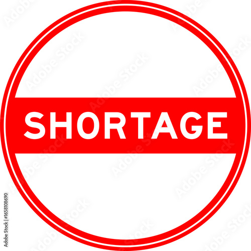 Red color round seal sticker in word shortage on white background