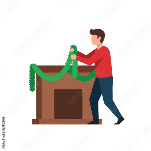 A man in a red sweater decorating a fireplace with a green garland for the holidays.