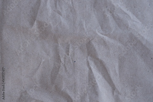 Brown crumpled recycled paper texture background. Kraft Paper