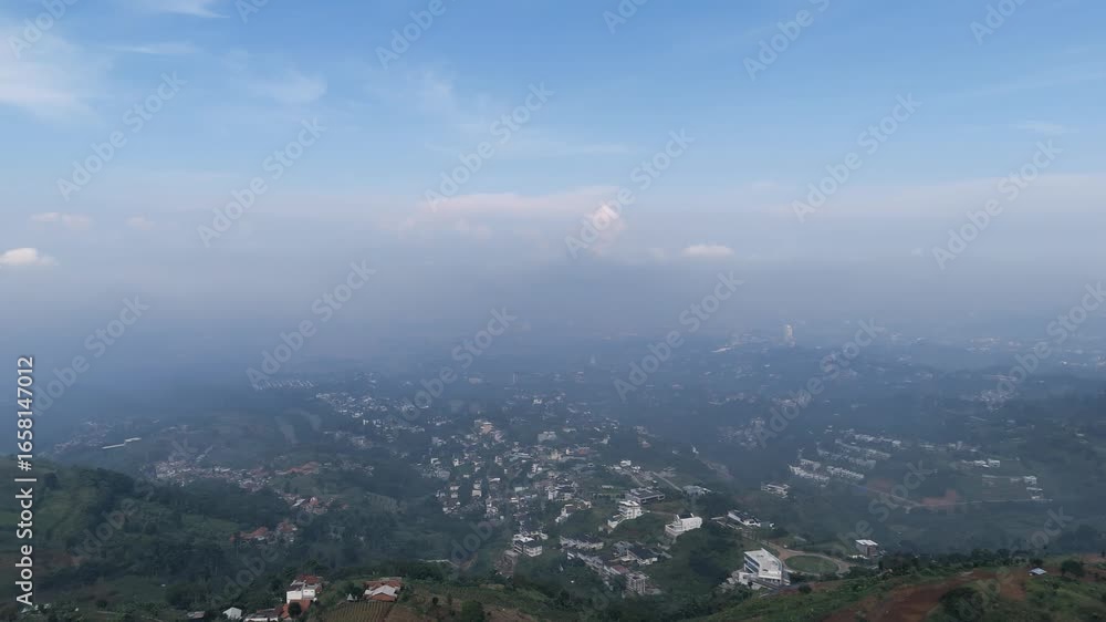 Overlooking Mountain Valley with Foggy Conditions Aerial View Overlooking Mountain Valley with Foggy Conditions Aerial View