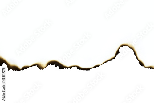 Old burnt paper page edge texture. Vintage grunge border design element, isolated on white background with clipping path.