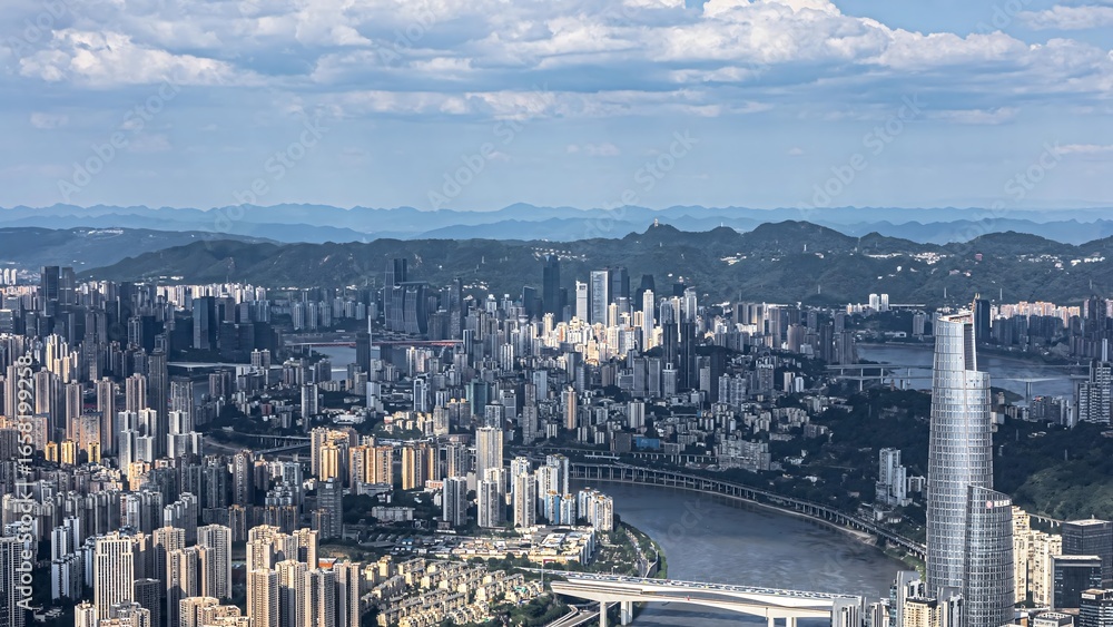Obraz premium Aerial view of Chongqing city skyline at sunset with mountains and river, China urban landscape