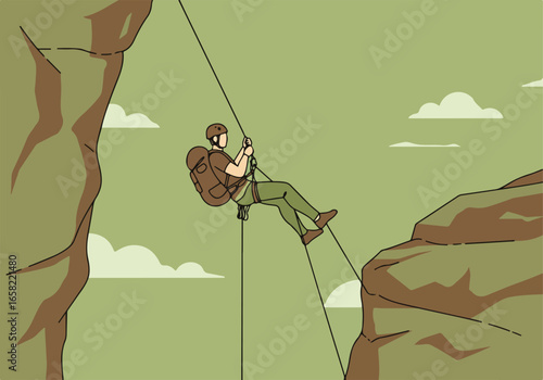 Adventurer rappels down rock face, using safety rope. Sky & valley vista behind