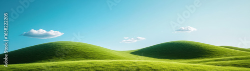 Green hill landscape under clear blue sky with fluffy white clouds creating peaceful and refreshing outdoor scene