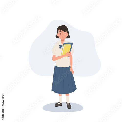 thai student schoolgirl in thai school uniform holding books education studying concept