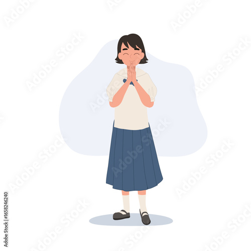a thai primary schoolgirl in chosong uniform smiling brightly while greeting with wai gesture