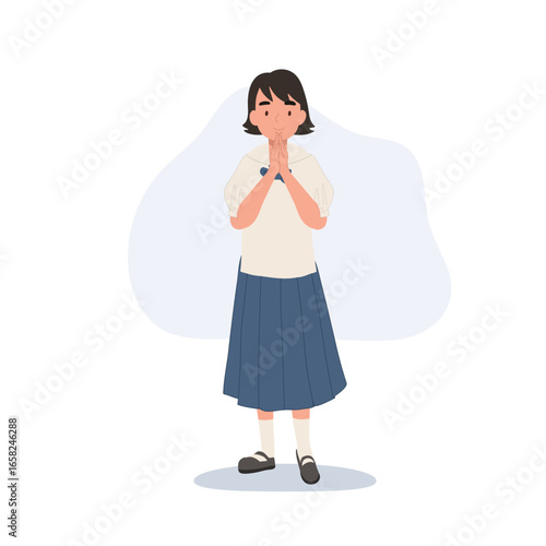 a thai primary schoolgirl in chosong uniform smiling brightly while greeting with wai gesture