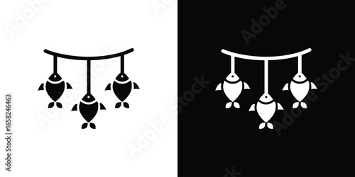 Three Fish Hanging on a Line, Isolated on White Background