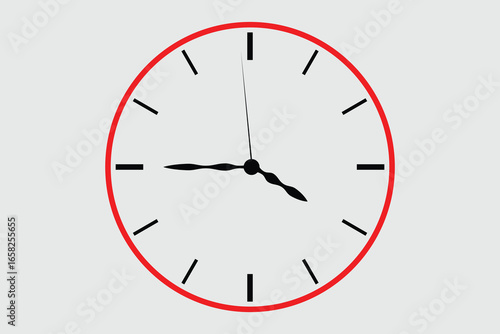 A simple red and white clock with black hands shows the time, isolated on a white background