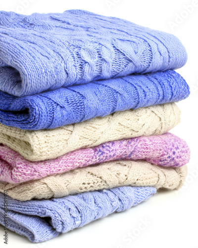 Wallpaper Mural Cozy folded sweaters in pastel colors symbolize warmth and care at end of long day Torontodigital.ca