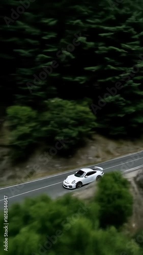 Fast car driving on road, motion blur effect, speed and adrenaline concept.