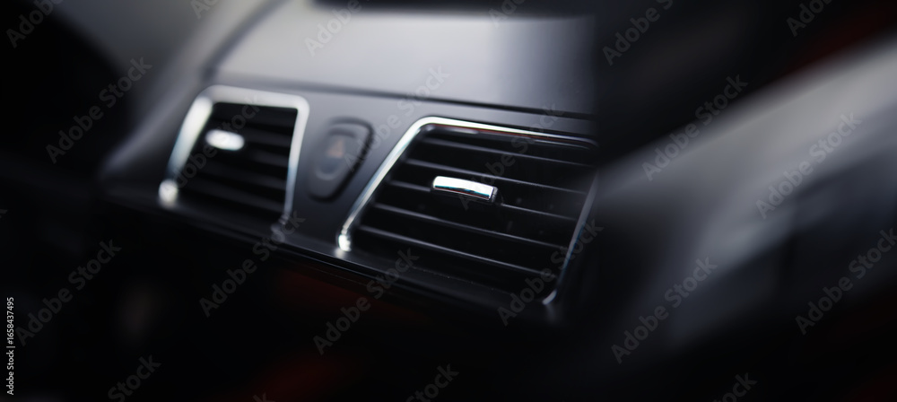 Naklejka premium The process of choosing climate control in the car. Various controls in auto switches. Modern car interior