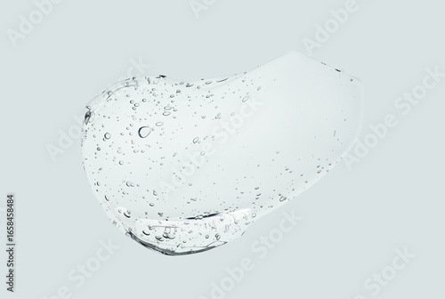 Cream gel clear transparent cosmetic sample texture with bubbles isolated on light grey background