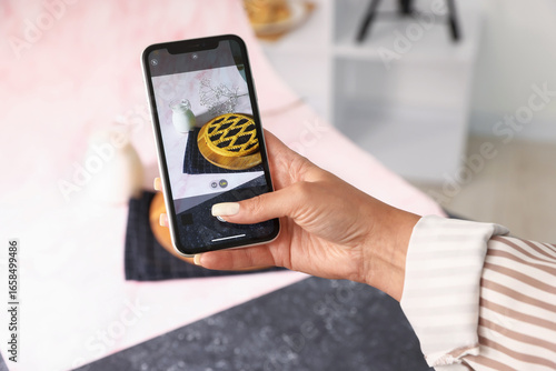 Wallpaper Mural Woman taking picture of tasty pie and milk in studio, selective focus. Professional food photography Torontodigital.ca