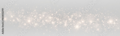 Golden sparks and shimmering dust. Bright highlights and glowing stars create a festive and magical atmosphere.