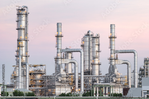 Wallpaper Mural Oil gas refinery plant or petrol chemical plant at duck sky background. Heavy industry in Map Ta Phut Industrial Estate to processing, manufacturing petroleum products i.e. diesel fuel and gackground. Torontodigital.ca