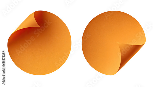 Two orange circular stickers with curled edges