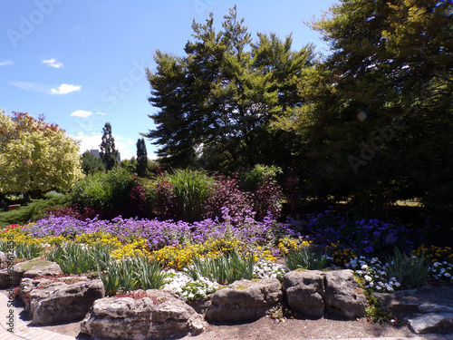 Wallpaper Mural Summer park's landscape with trees and flower beds Torontodigital.ca