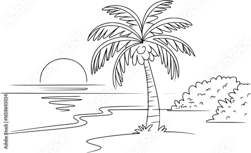 Tropical palm tree at sunset over the ocean water beach