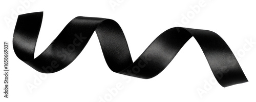 A dark, elegant black ribbon curls in a graceful, flowing design