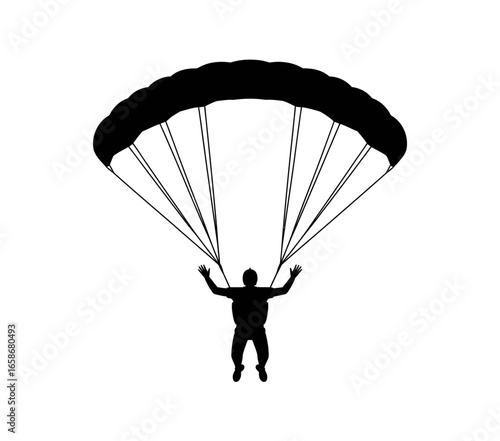 silhouette of a man with parachute