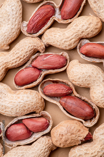 Wallpaper Mural Pile of whole and cracked peanuts close up. Food background. Torontodigital.ca