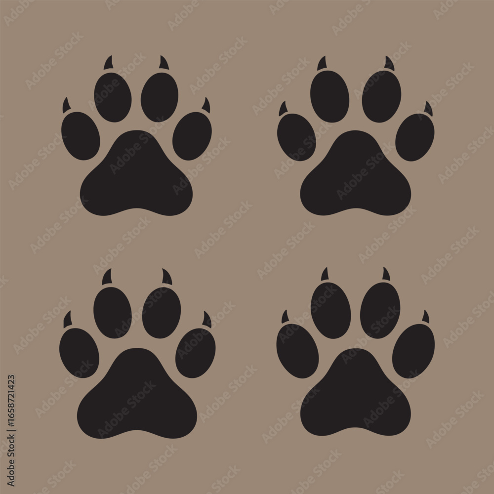 Fototapeta premium Four black paw prints 