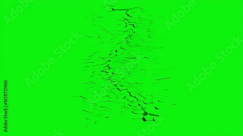 Realistic ground or wall crack effect on a green chroma key background for VFX compositing