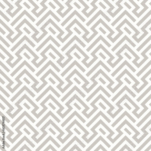 Abstract Geometric Seamless Pattern with Interlocking L-Shapes.