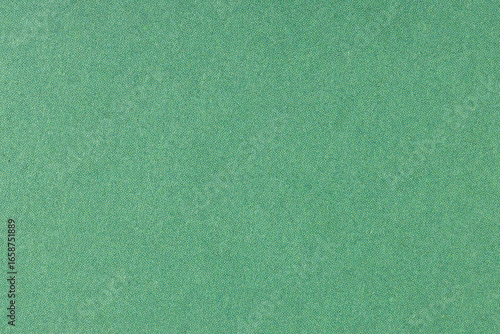 Green offset printed paper background texture. Macro close up. Full frame