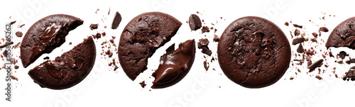 Broken chocolate cookies, dark brown, with flying pieces