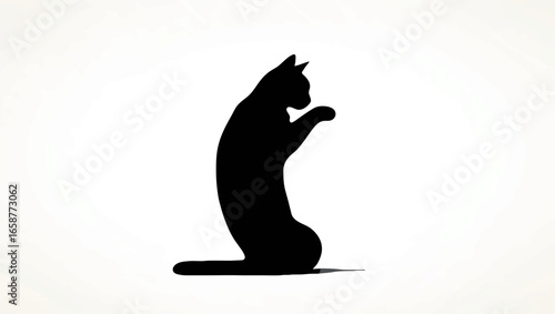 Cat Stretching Upwards in Silhouette

