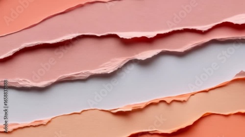 Arranging Layers of Torn Paper to Create a Textured Background
