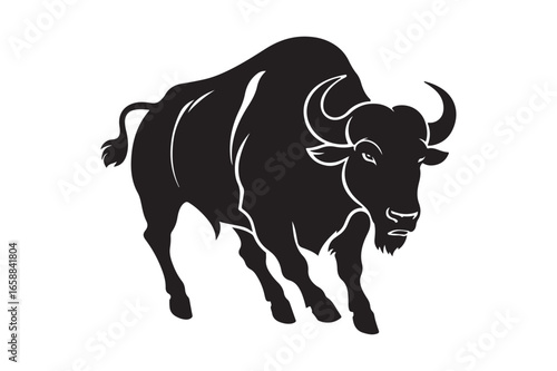 Powerful black silhouette of a charging bull