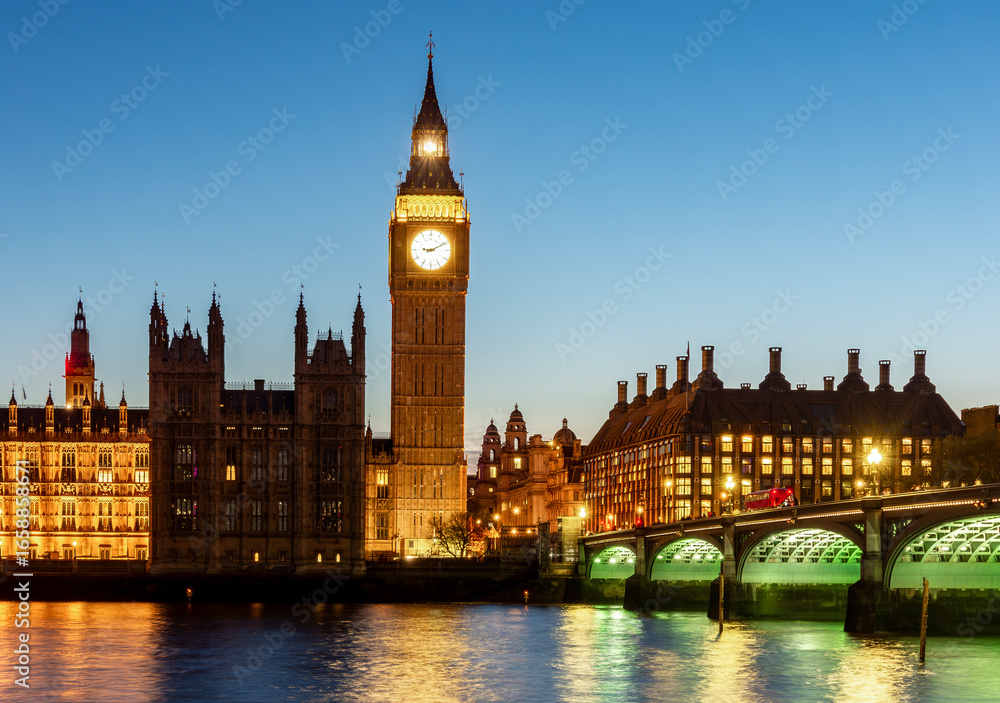 Big Ben tower and Westminster bridge at night, London, UK Big Ben tower and Westminster bridge at night, London, UK