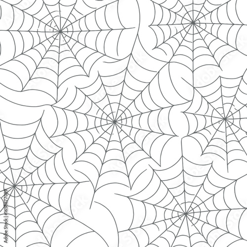 A cluster of detailed spider webs radiating from central points, each web exhibiting perfect symmetry and precision. The stark white lines against the