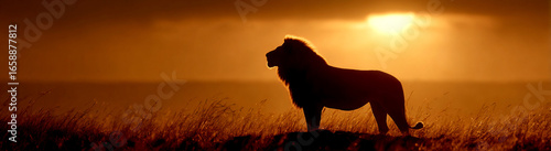 Majestic lion silhouette against a vibrant sunset in the African savanna