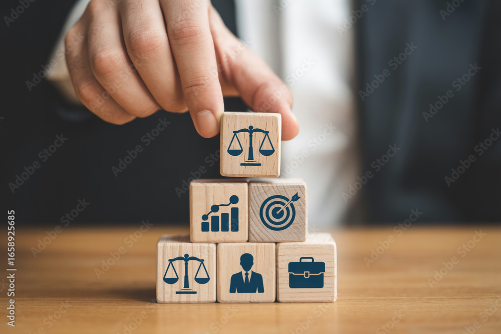 Naklejka premium Legal business strategy concept with wooden blocks and icons for law firm development